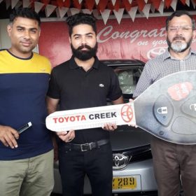 Toyota Creek Motors Happy Customer Receiving New Car